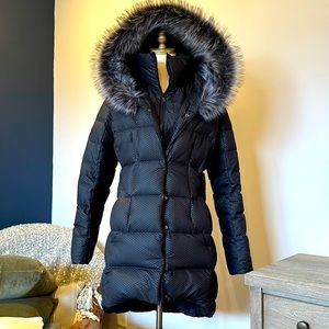 North Face puffer with fur lined hood (not removable) size Medium.